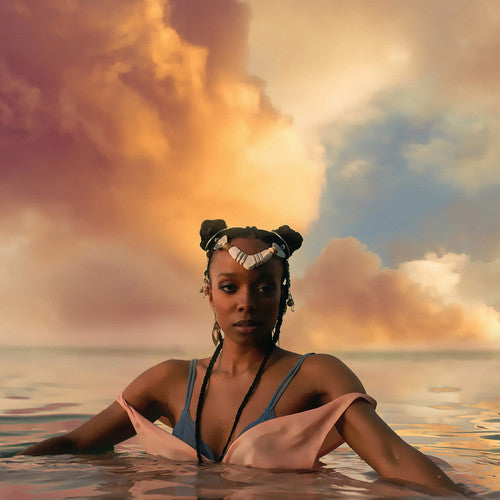 the album cover for Jamila Woods - Heavn [Indie Exclusive Limited Edition White LP]