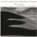 the album cover for Joshua Redman & Brooklyn Rider - Sun On Sand