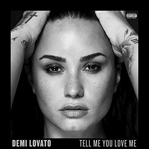 the album cover for Demi Lovato - Tell Me You Love Me