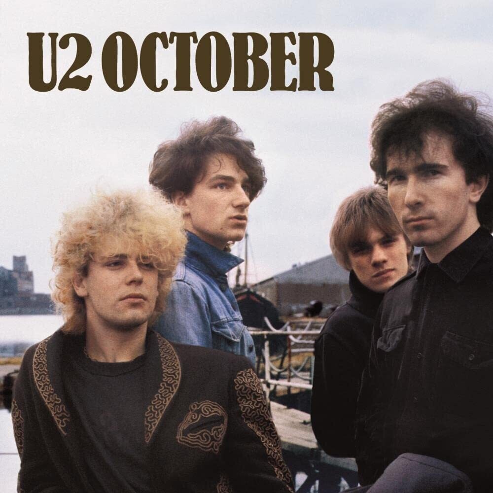 the album cover for U2 - October: Remastered [Limited Edition Cream LP]