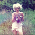 the album cover for The World Is A Beautiful Place & I Am No Longer Afraid To Die - Assorted Works