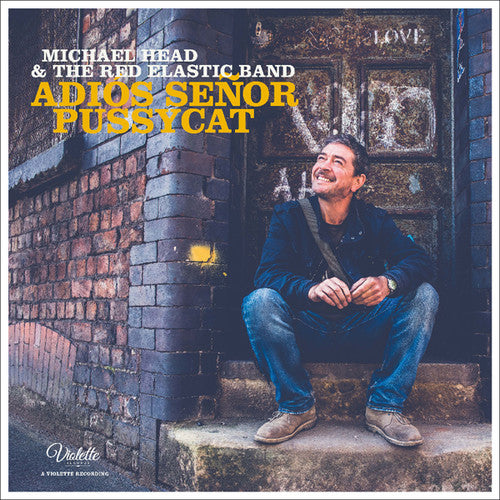 the album cover for Michael Head & Red Elastic Band - Adios Senor Pussycat