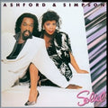 the album cover for Ashford & Simpson - Solid
