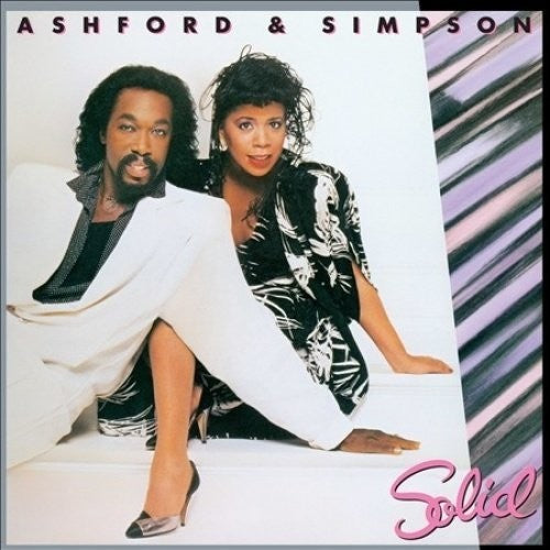 the album cover for Ashford & Simpson - Solid