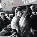 the album cover for A-Ha - Hunting High And Low