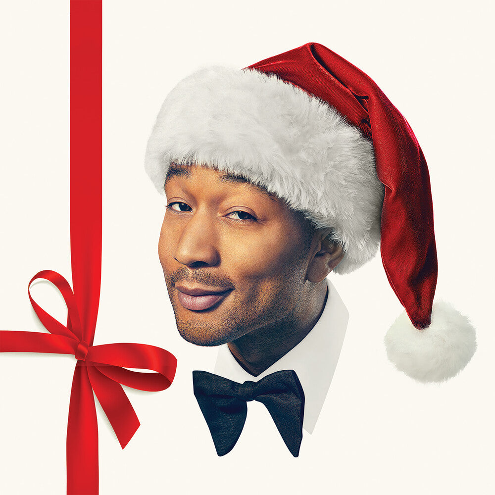 the album cover for John Legend - A Legendary Christmas: Deluxe Edition