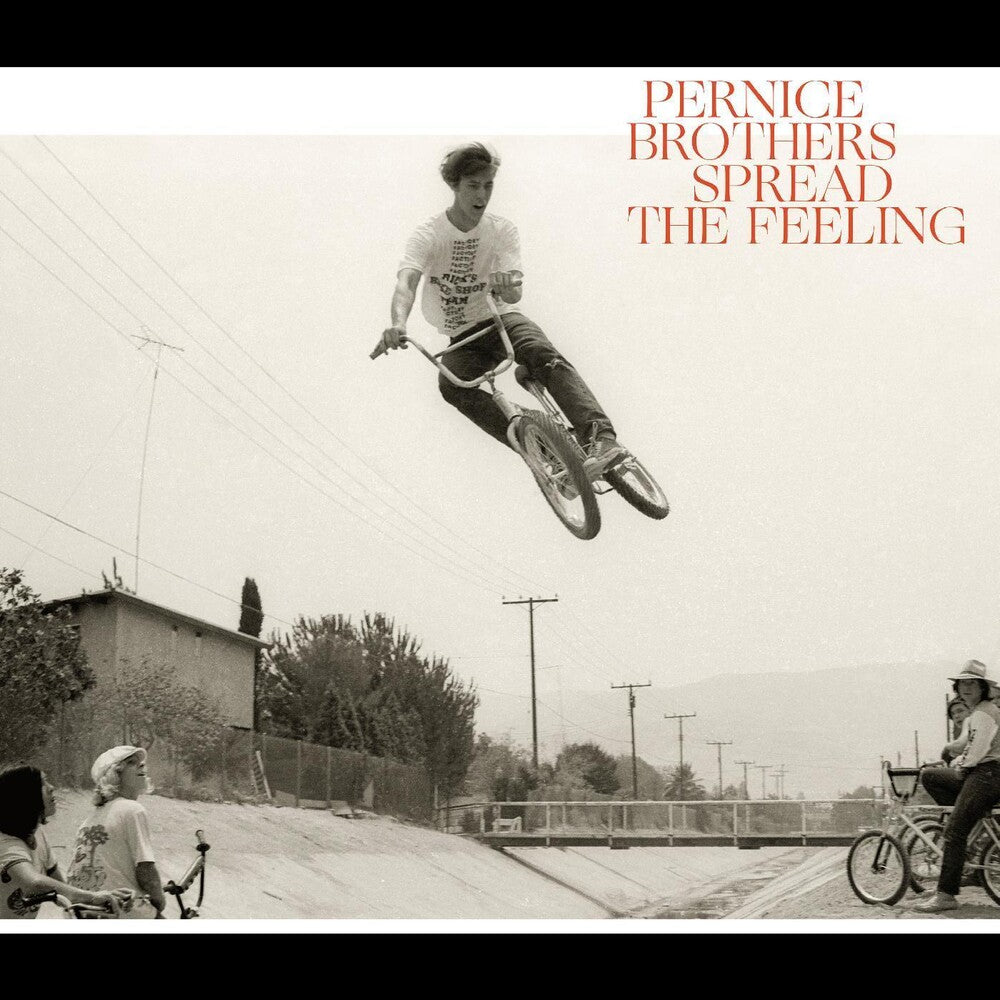 the album cover for Pernice Brothers - Spread The Feeling [Colored Vinyl] (Red)