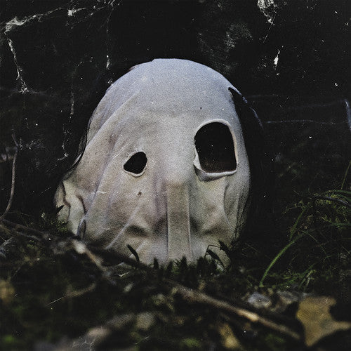 the album cover for The Faceless - In Becoming A Ghost