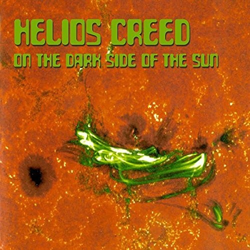 the album cover for Helios Creed - On The Dark Side Of The Sun