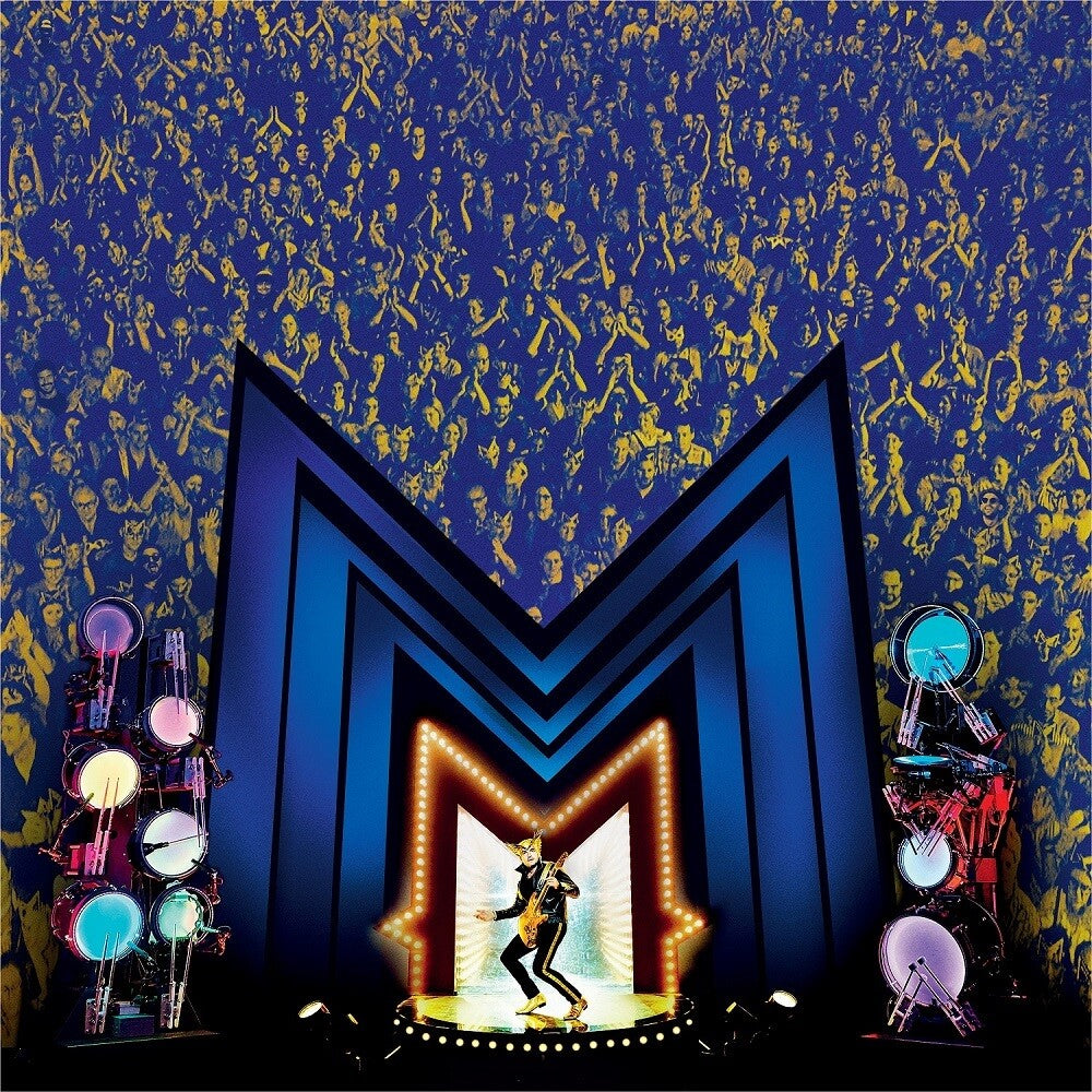 the album cover for -M- Matthieu Chedid - Le Grand Petit Concert