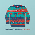 the album cover for Various Artists - This Warm December, A Brushfire Holiday Vol. 3 [Opaque White LP]