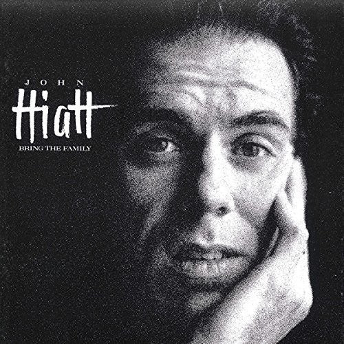 the album cover for John Hiatt - Bring The Family
