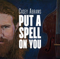 the album cover for Casey Abrams - Put A Spell On You