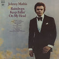 the album cover for Johnny Mathis - Raindrops Keep Fallin' On My Head