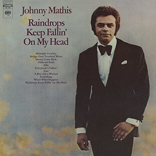 the album cover for Johnny Mathis - Raindrops Keep Fallin' On My Head