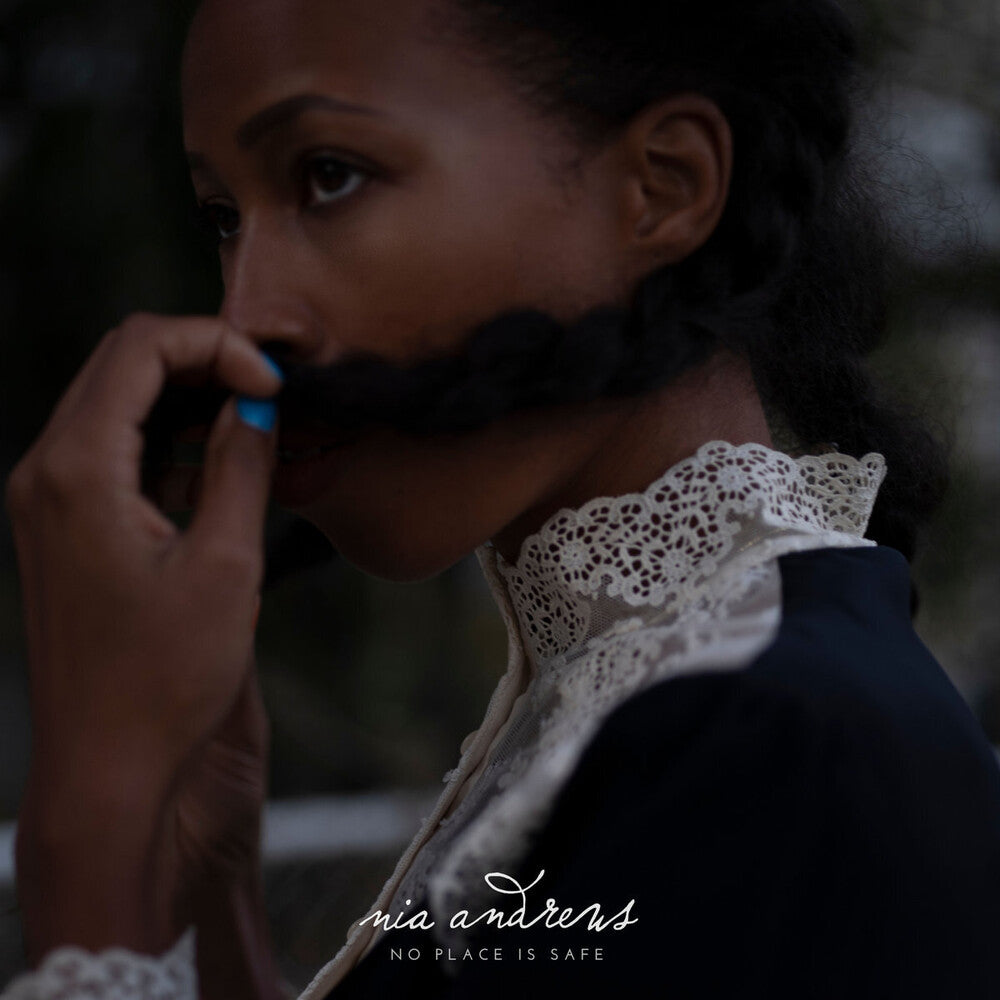 the album cover for Nia Andrews - No Place Is Safe