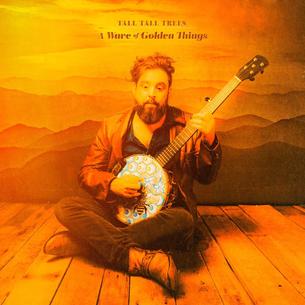 the album cover for Tall Tall Trees - A Wave Of Golden Things