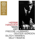 the album cover for Herbie Hancock - Takin Off