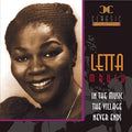 the album cover for Letta Mbulu - In The Music...the Village Never Ends
