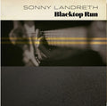 the album cover for Sonny Landreth - Blacktop Run [Gold LP]