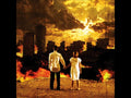the album cover for Scary Kids Scaring Kids - City Sleeps In Flames