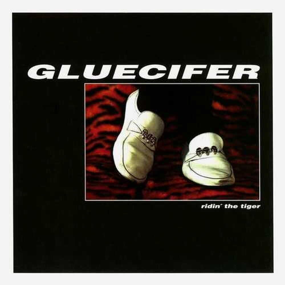 the album cover for Gluecifer - Ridin' The Tiger