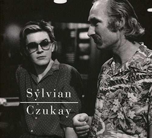 the album cover for David Sylvian / Czukay,Holger - Plight & Premonition Flux & Mutability