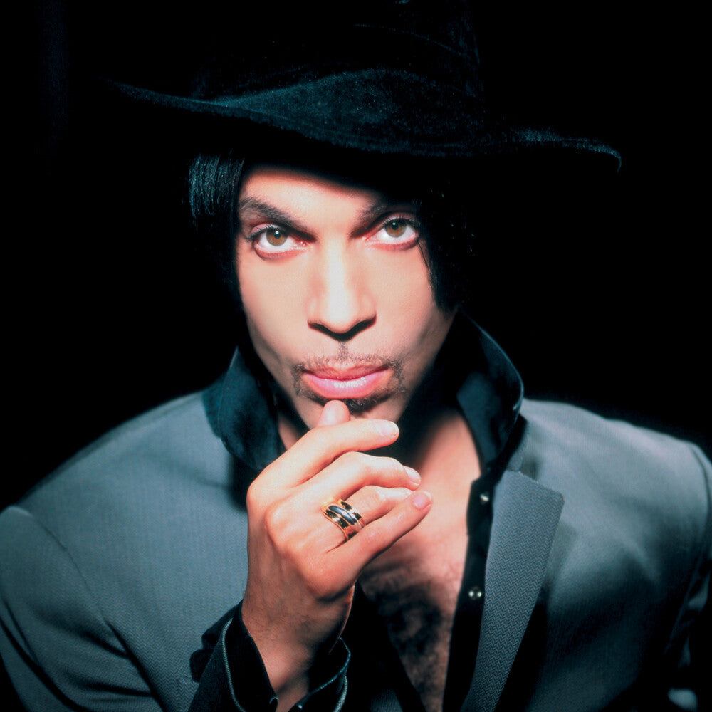 the album cover for Prince & The New Power Generation - One Nite Alone…Live! [Purple 4LP]