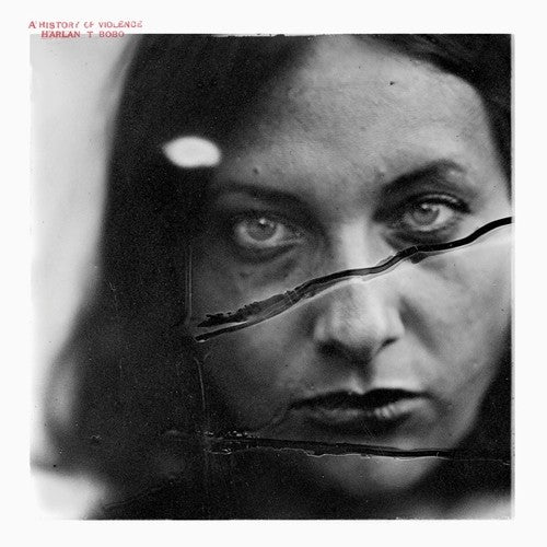 the album cover for Harlan Bobo T - A History Of Violence
