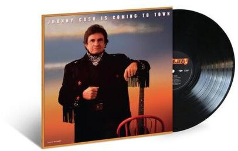 the album cover for Johnny Cash - Johnny Cash Is Coming To Town [LP]