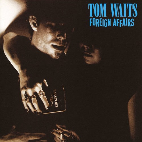 the album cover for Tom Waits - Foreign Affairs [Indie Exclusive Limited Edition Remastered Gray LP]