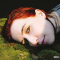the album cover for Austra - Hirudin [Colored Vinyl] (Grn) [Indie Exclusive] [Download Included]