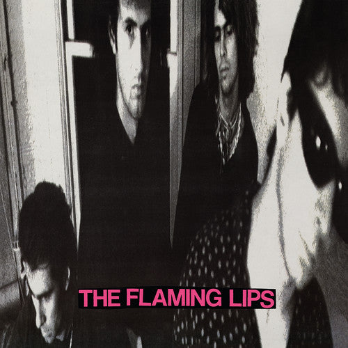 the album cover for The Flaming Lips - In A Priest Driven Ambulance [Remastered LP]