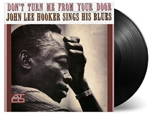 the album cover for John Lee Hooker - Don't Turn Me From Your Door