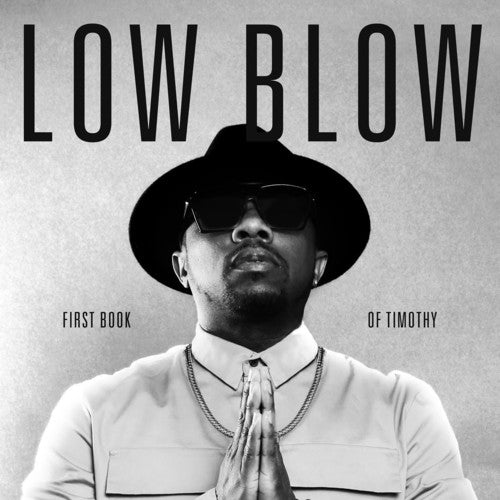 the album cover for Low Blow - First Book Of Timothy
