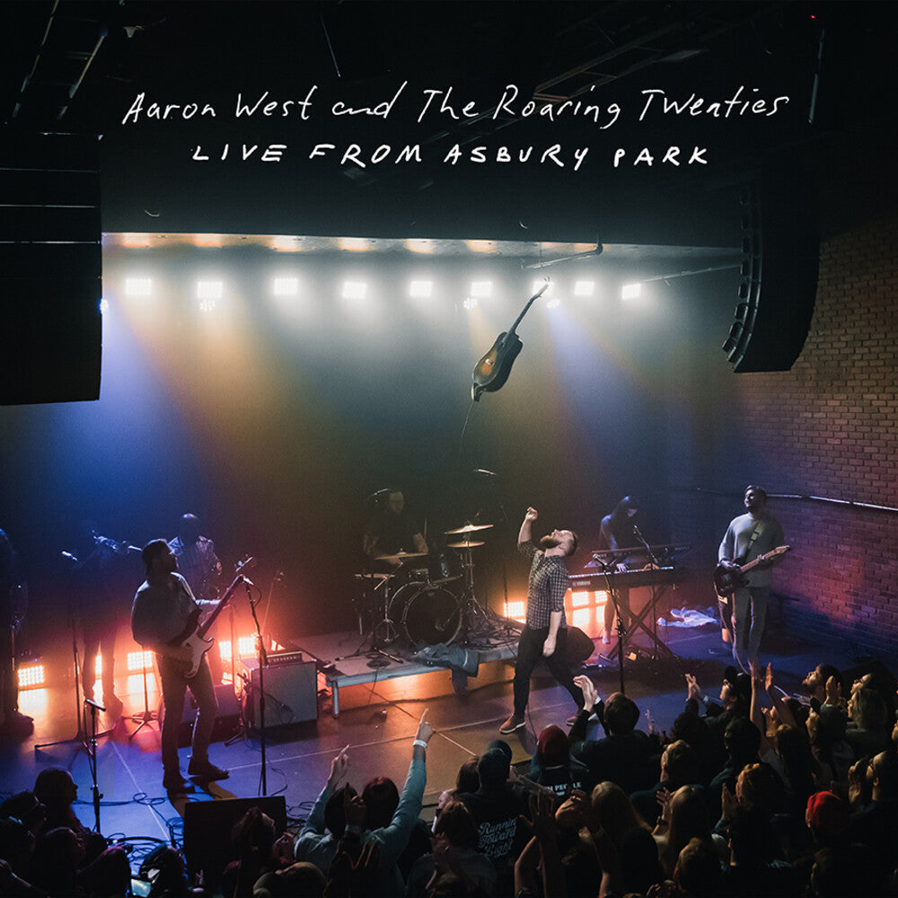 the album cover for Aaron West & The Roaring Twenties - Live From Asbury Park [Indie Exclusive Limited Edition Mustard Yellow LP]