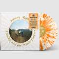 the album cover for Frankie and the Witch Fingers - Heavy Roller [Indie Exclusive Limited Edition Tangerine Creamsicle Heavy Splatter LP]