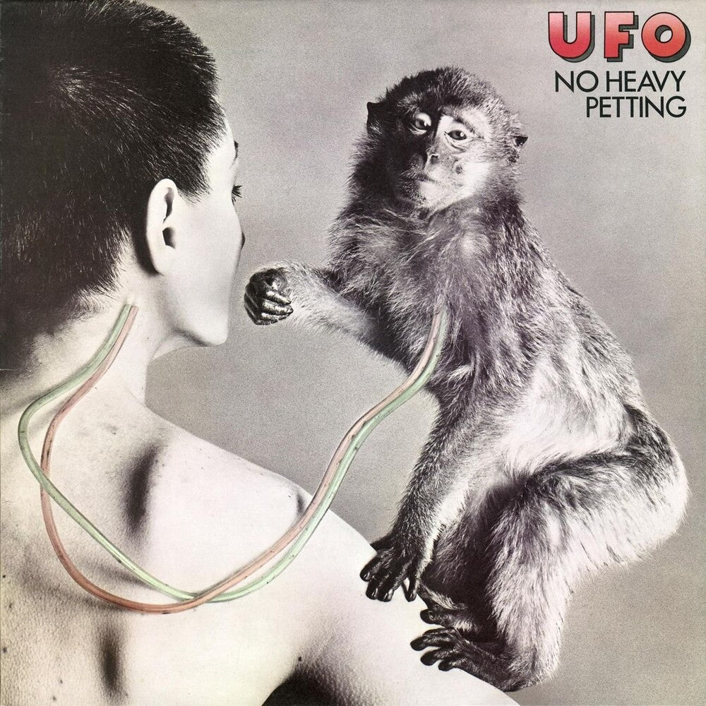 the album cover for UFO - No Heavy Petting