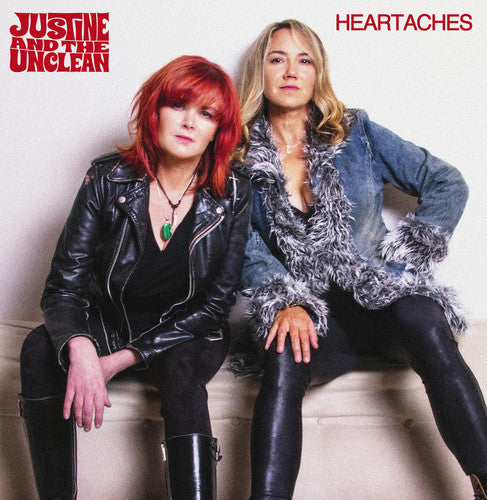 the album cover for Justine & Unclean - Heartaches