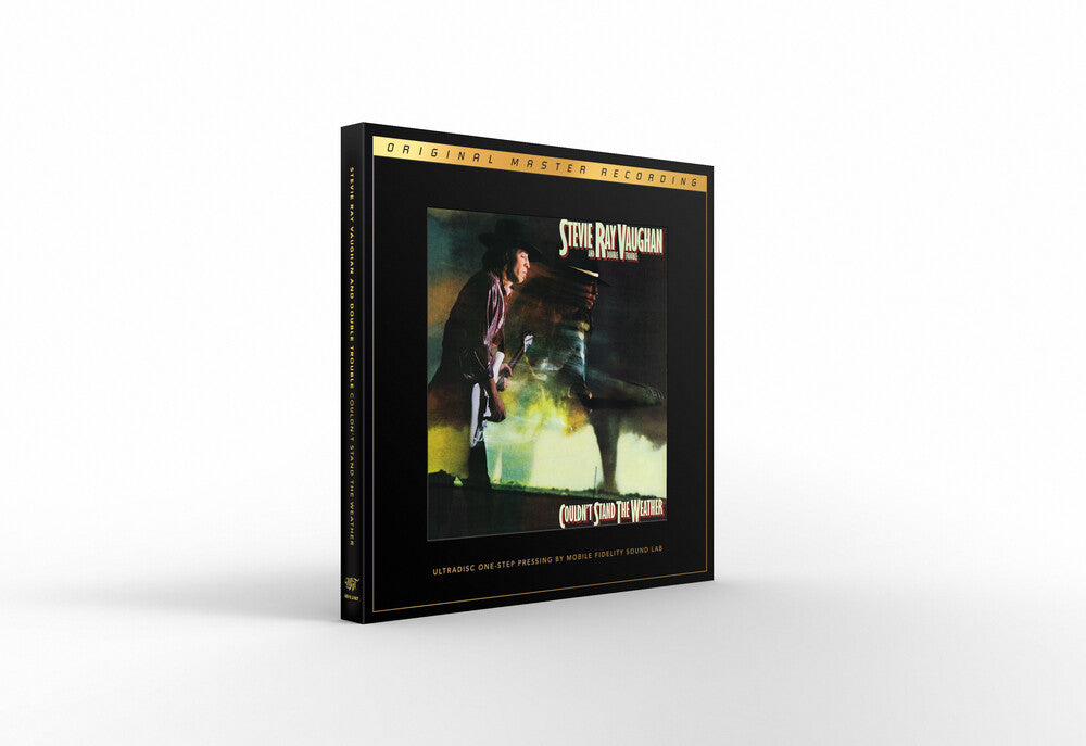 the album cover for Stevie Vaughan Ray / Double Trouble - Couldn't Stand The Weather