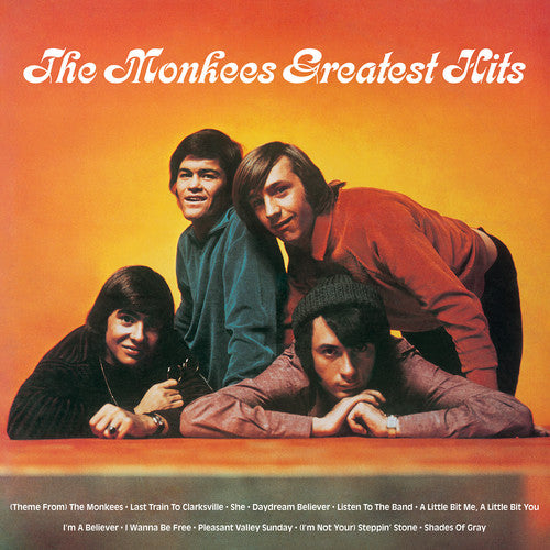the album cover for The Monkees - The Monkees Greatest Hits [SYEOR Exclusive 2019 Orange LP]