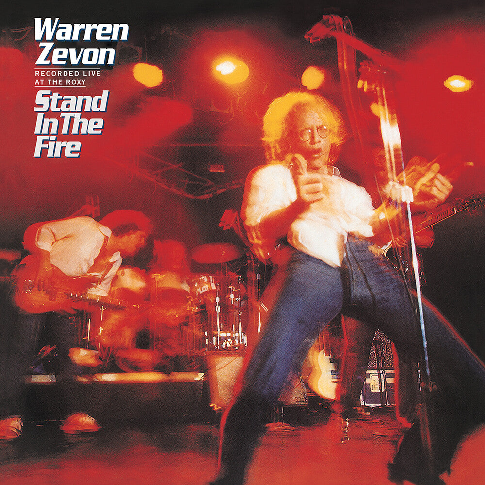 the album cover for Warren Zevon - Stand In The Fire: Recorded Live At The Roxy [Deluxe LP]