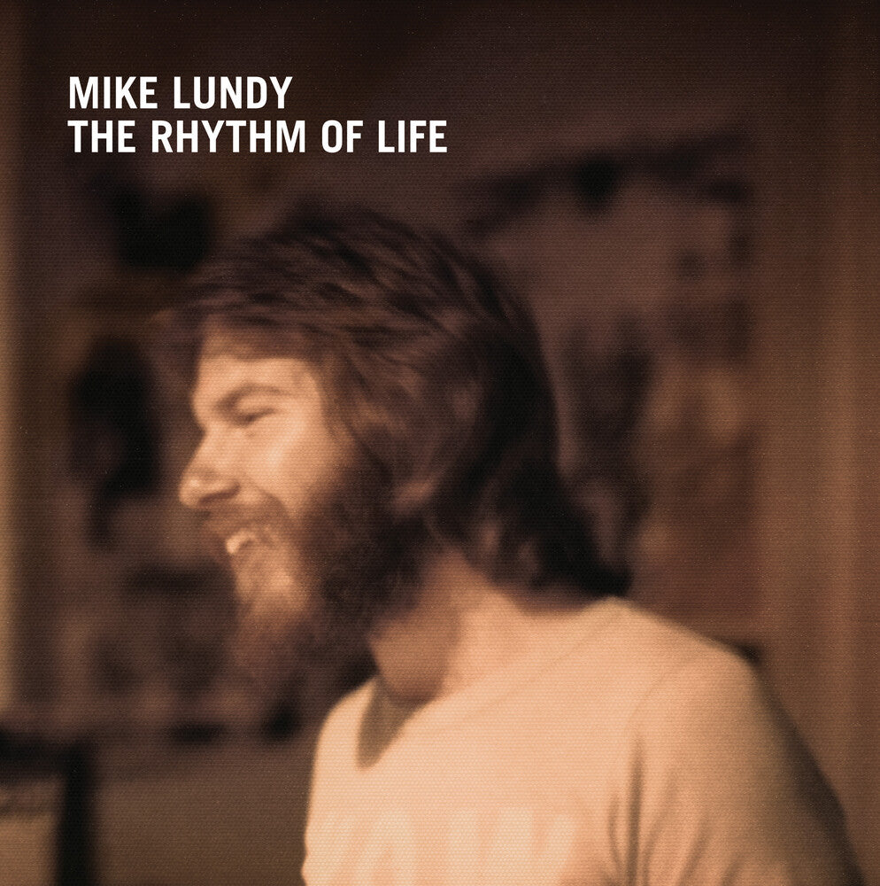 the album cover for Mike Lundy - The Rhythm Of Life