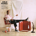 the album cover for Arlo Parks - Collapsed In Sunbeams [Indie Exclusive Limited Edition Mustand Yellow LP]