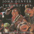 the album cover for John Denver & The Muppets - A Christmas Together [Translucent Green LP]