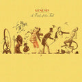 the album cover for Genesis - A Trick of the Tail [SYEOR 2021 Easter Yellow LP]