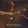 the album cover for Mac Mcanally - Once In A Lifetime