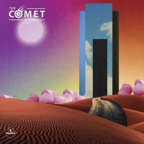 the album cover for The Comet Is Coming - Trust In The Lifeforce Of The Deep Mystery [LP]