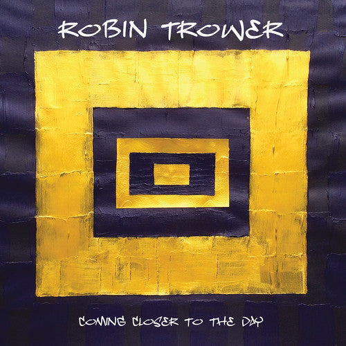 the album cover for Robin Trower - Coming Closer To The Day