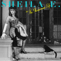 the album cover for Sheila E. - The Glamorous Life [Teal LP]